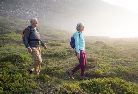 Photo: Couple hiking outdoors.