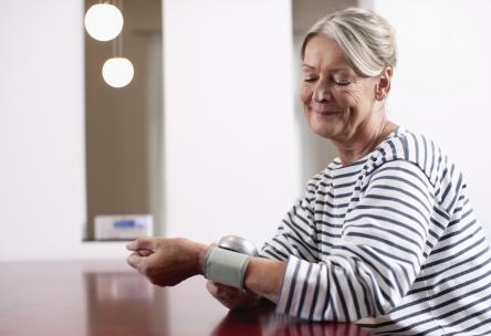 woman checking pulse