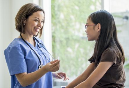 Nurse talking to patient
