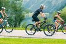 Photo: Family riding bikes along a paved path