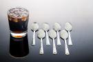 drink and spoons with sugar