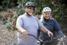 middle aged couple on bikes
